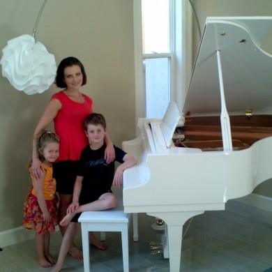 Laura Roytman with her new piano from Piano Megastore