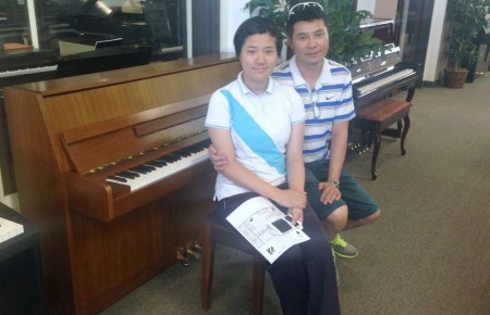 The Lius family and their Kawai Console