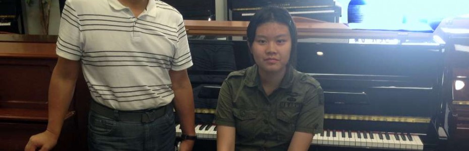 Summer and her Pearl River piano.