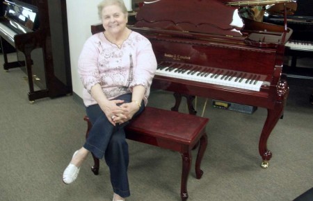 Ann Moorefield and her Kohler & Campbell Art Case Player Piano