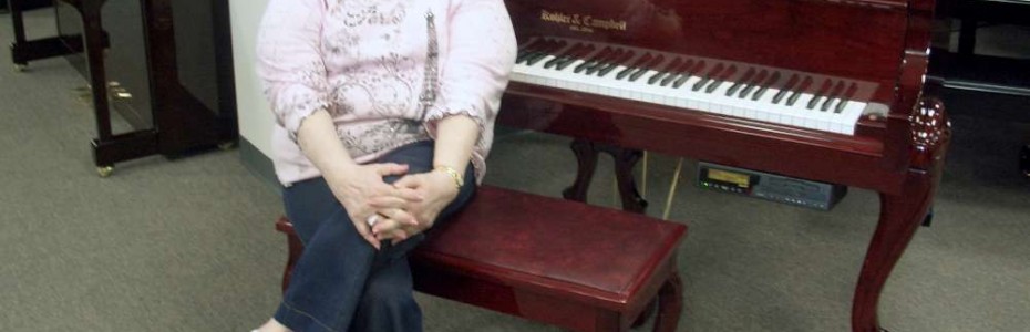 Ann Moorefield and her Kohler & Campbell Art Case Player Piano
