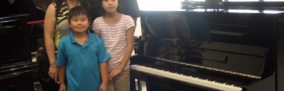 Josephine Koh and Family with their new Kingsburg Studio Piano