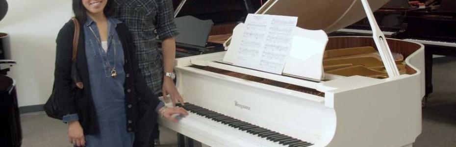 The Nguyens and their Bergmann Baby Grand Piano